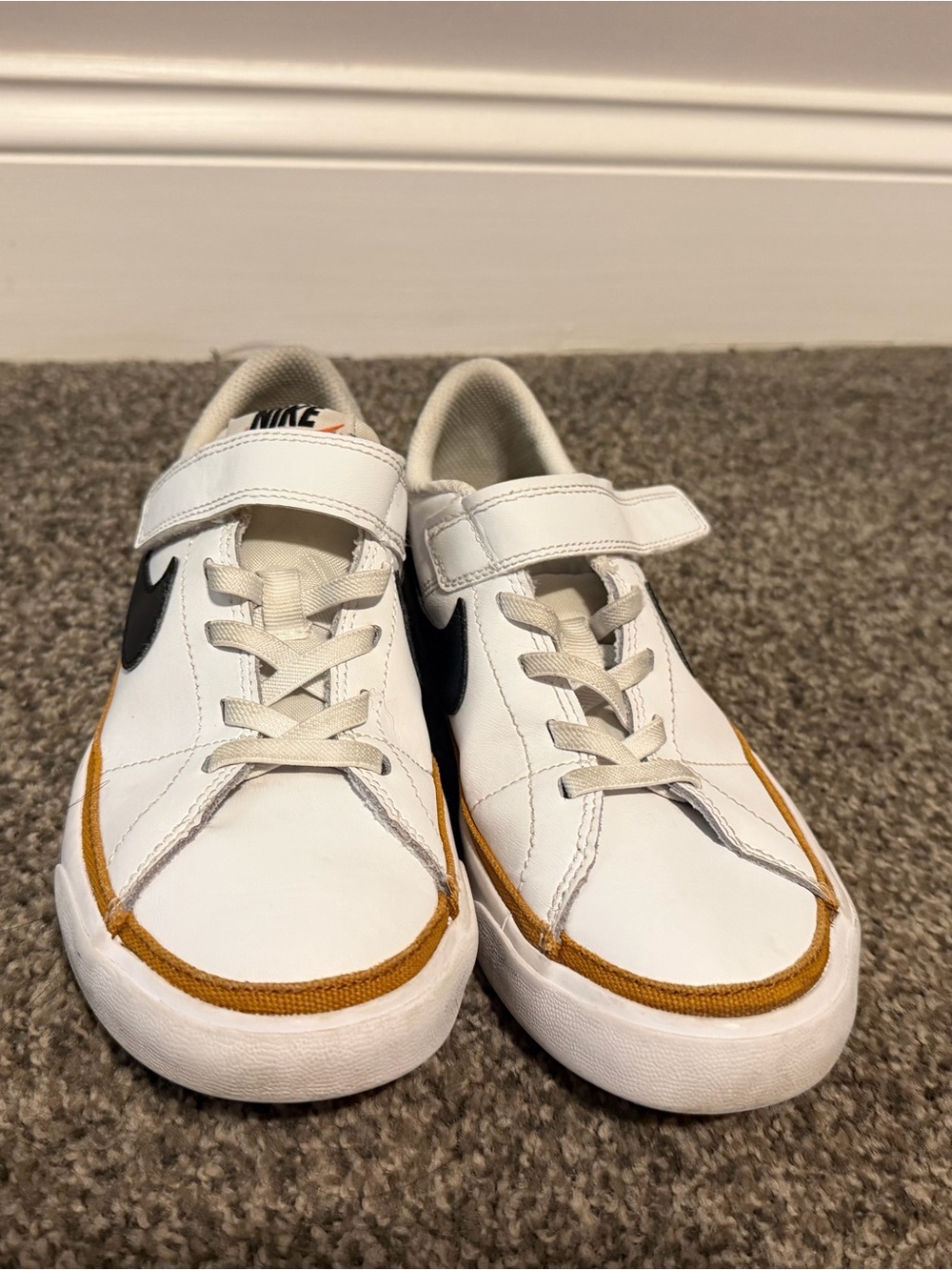 Nike Kids White Sneakers with Black Swoosh and Tan Trim